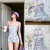 Traje de baño de competición "Mensaje de Flor de Primavera" para adultos, alberca profesional, entrenamiento brillante, de una pieza sin espalda con perneras planas, modelo nuevo para mujer