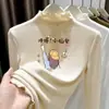 Ropa interior térmica para niñas Otoño/Invierno 2026 Nuevo estilo Terciopelo alemán Top de manga larga con volantes y cuello alto para niños de mediana y mayor edad