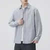 Camisa de hombre de tela Oxford a rayas estilo japonés 2026 nuevo otoño algodón puro cuello camisero manga larga chaqueta venta al por mayor