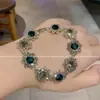 Pulsera de Cristal de Zirconia Colorida Estilo Palacio Retro de Lujo Ligero Nueva Celebridad de Internet Temperamento Simple Pulsera de Gama Alta
