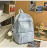 Mochila de Rayas Estilo Japonés Ins Modelo Nuevo Primavera/Verano 2026 Bolso Escolar de Alto Valor para Estudiantes Universitarios para Mujer Mochila Pequeña Ligera