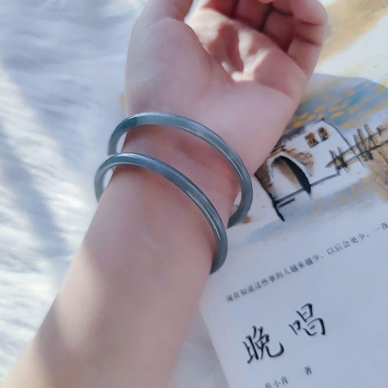 复制_叮当镯细款玉镯子仿玛瑙雾霾蓝琉璃仿玉手镯.jpg