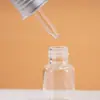 El Fabricante Suministra Botellas de Vidrio con Materiales de Empaque de Alta Gama, Botellas de Vidrio para Cremas de Esencia, Botellas de Vidrio para Cosméticos y Botellas de Vidrio