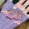 Alcancía Tridimensional Llavero de Alta Gama Carcasa de Auriculares Colgante de Celebridad de Internet Accesorios para Mochila Joyería Colgante Linda Corazón de Niña