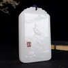 Venta al por mayor de fábrica jade blanco afgano con colgante de jade Yu para hombres y mujeres Piel de oveja Collar con colgante de pez dorado de jade blanco