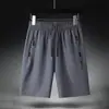 Shorts com zíper de bolso para homens Seda no gelo Verão Ultrafino solto plus size Esportes Corrida Casual Shorts de secagem rápida