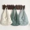 Bolsa de tricô casual vazada estilo coreano para mulheres, nova bolsa tote de palha grande capacidade para o verão de 2026, bolsa de praia