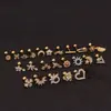 Pendientes de botón de flor creativos transfronterizos, nuevos, de acero inoxidable, con tornillo, para oreja de circonita femenina, clavos de hueso, comercio exterior, venta caliente, perforación