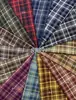 Nueva tela de cuadros TR tejida de otoño e invierno falda JK ropa para niños camisa de mujer tela de cuadros teñida en hilo ropa informal venta al por mayor