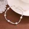 Pulsera de plata de ley S925 con dos perlas naturales, diseño minimalista, ligero y de alta calidad.