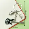 Diseño Creativo Plata Vintage Saxofón Cinta Musical Llavero Transfronterizo Más Vendido Colgante de Bolsa Pequeño Accesorio