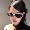 Gafas de Sol para Mujer con Diseño Retro de Pantalla Curva de Gama Alta Montura Blanca Ojo de Gato Antivioleta para Rostros Cuadrados y Redondos