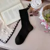 Nuevos calcetines de otoño para mujer, estilo coreano, a cuadros con lazo, calcetines versátiles de media pantorrilla, patrón oscuro hueco vintage, calcetines holgados color café