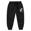 Calça Longa Infantil Estilo Coreano Primavera e Outono 2023 Roupa Externa para Bebê Calça de Terry Lisa de Algodão Puro Esportiva Casual Neutra