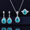 Nuevo traje de imitación Paraíba para mujer Anillo de apertura de diamantes completos de lujo europeo y americano Pendientes Caibao Collar colgante