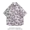 Camisa floral estilo Hong Kong verão estilo havaiano retrô manga curta estilo masculino jovem roupa de casal design solto sentido de design top com lapela