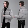 Moda versátil de algodão para o inverno de 2026, design simples de lapela, estilo coreano, corte solto, jaqueta de algodão quente feminina