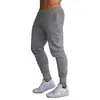 Novas Calças Esportivas de Cor Sólida para Primavera e Outono de Comércio Exterior Calças Jogger Masculinas Calças Compridas Fitness Moda Calças Casuais Slim Fit Calças de Corrida