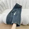 Jeans Americano Retrô de Cintura Alta com Barra Larga e Dois Botões Outono Feminino 2026 Novo Estilo Caimento Solto Casual Calça Reta