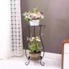 Soporte de flores de hierro forjado, estilo europeo, de pie, estante para macetas de interior de varios niveles para sala de estar y balcón, adecuado para plantas en maceta como plantas araña y plantas en maceta.