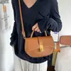 Bolsa Pequeña Cuadrada Fresca Dulce Portátil al por Mayor para Mujer 2026 Verano Nuevo Color Sólido Hebilla de Cierre Bolso de Hombro Único Bolso Cruzado para Viajes Diarios