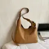 Nova bolsa tote de couro PU 2026, uma bolsa de mão elegante e espaçosa para mulheres, perfeita para o trabalho e para o dia a dia, pode ser carregada como bolsa de ombro ou bolsa de mão