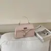 2026 Nuevo Bolso de Mano Retro de Otoño de Gama Alta Bolso Tote Pequeño Bolso Cuadrado Pequeño para Mujer Bolso Cruzado Simple de un Solo Hombro