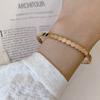 Diseño de lujo ligero estilo ins acero titanio chapado en oro de 18K panal panal pulsera pulsera pulsera simple y elegante
