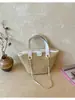 Bolso de hombro pequeño de cadena a la moda estilo Chanel, bolso de viaje de playa tejido único, bolsa de cesta de paja simple