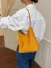 Bolso de axila tejido de estilo coreano de nicho para mujer, bolso casual de moda y tendencia para madre e hija, bolso de color liso de gran capacidad para mujer