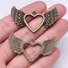 47x 29mm 4.5g comercio exterior AliExpress explosiones calientes colgante de corazón de amor alas de amor huecas