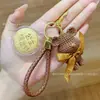 Oro Puro 999 Moneda Pequeña Hilo de Resina Oso Llavero Bolso de Moda Accesorio Llavero de Coche Colgante Lindo