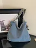 Colección nueva 2026: bolso de mano de alta gama, estilo vintage, de nicho para mujer, con una estética casual y relajada, diseño versátil, construcción ligera y gran capacidad