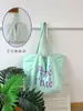 Bolsa Coreana de Nailon Dopamina Doble Cara Estilo Perezoso Rayas de Colores Estampado de Letras Simple Bolsa para Estudiantes y Viajeros