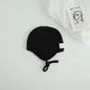 Bonitos y adorables gorros de otoño e invierno para niños, con diseño de poner, material de punto y una serie de dibujos animados, que brindan abrigo y protección para los oídos para bebés y niños pequeños.