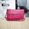 Primeira camada de couro de vaca bolsa de chaves carteira de moedas de couro bolsa de mão estilo europeu e americano explosões transfronteiriças porta-cartões envelope vermelho atacado
