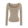 Atacado de roupas femininas transfronteiriças 2026 outono novo sexy garota popular bolso patch grande gola U longa manga longa camisa base overlock