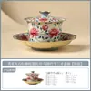 Taza de té de cerámica hecha en fábrica con tapa, con diseños de loto y peonía, adecuada para uso doméstico, parte de un juego de té Kung Fu, con un asa que no quema la mano