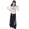 Conjunto de Dos Piezas para Niñas Primavera y Otoño 2026 Nuevo Otoño Camiseta Rayada para Niñas Pantalones Largos Casuales Pantalones de Pierna Ancha para Niños Modernos