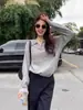 Polo de punto hueco estilo francés para mujer, adecuado para otoño e invierno, con un estilo "old money" de alta gama, chic, único y relajado, con cuello de solapa.