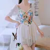 Nuevo traje de baño de una pieza estilo vestido con estampado floral y mangas abullonadas para mujer 2026, diseñado para ocultar el abdomen y crear un efecto adelgazante, perfecto para la playa, aguas termales y ropa de resort; disponible al por mayor
