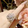 Camellia elegante Camellia Anillo abierto traje de rosa temperamento femenino de alta gama nicho correa de reloj de cuero