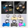 Fornecimento Transfronteiriço Aço Inoxidável Recorte Pata Osso Tag DIY Aço Titânio Pet Tag Anti-Perda Metal Argola de Pendurar Placa de Identificação para Cães