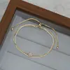 Joyería femenina de lujo ligero con circonita microincrustada y chapado en oro real, pulsera geométrica de cubo de azúcar de doble capa ajustable y extensible