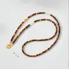 Colar versátil de contas de pedra olho de tigre natural, um acessório feminino para suéteres de outono e inverno, uma peça de joia longa, leve e luxuosa