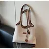 Bolsa de Ombro Transfronteiriça 2025 Nova de Nicho Moda Simples Bolsa Tote Grande Capacidade Portátil para o Dia a Dia Bolsa de Lona para Mulheres