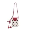 Bolso cubo 2026 nuevo modelo color lunares bloques de color bolso cruzado bolso cuadrado pequeño bolso cubo de un solo hombro patchwork bolso para teléfono debajo del brazo