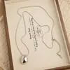 Colar minimalista com pingente de gota d'água oval escovado e cordão preto para mulheres, estilo coreano, corrente longa ajustável para suéter, acessório elegante e versátil