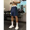 Shorts de basquete casual americano azul escuro de cinco pontas para homens, calças esportivas soltas de verão para corrida e treinamento