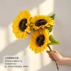 Girasol artificial de una sola flor transfronterizo flor falsa decoración del hogar sala de estar fotografía de boda de girasol ramo decorativo venta al por mayor